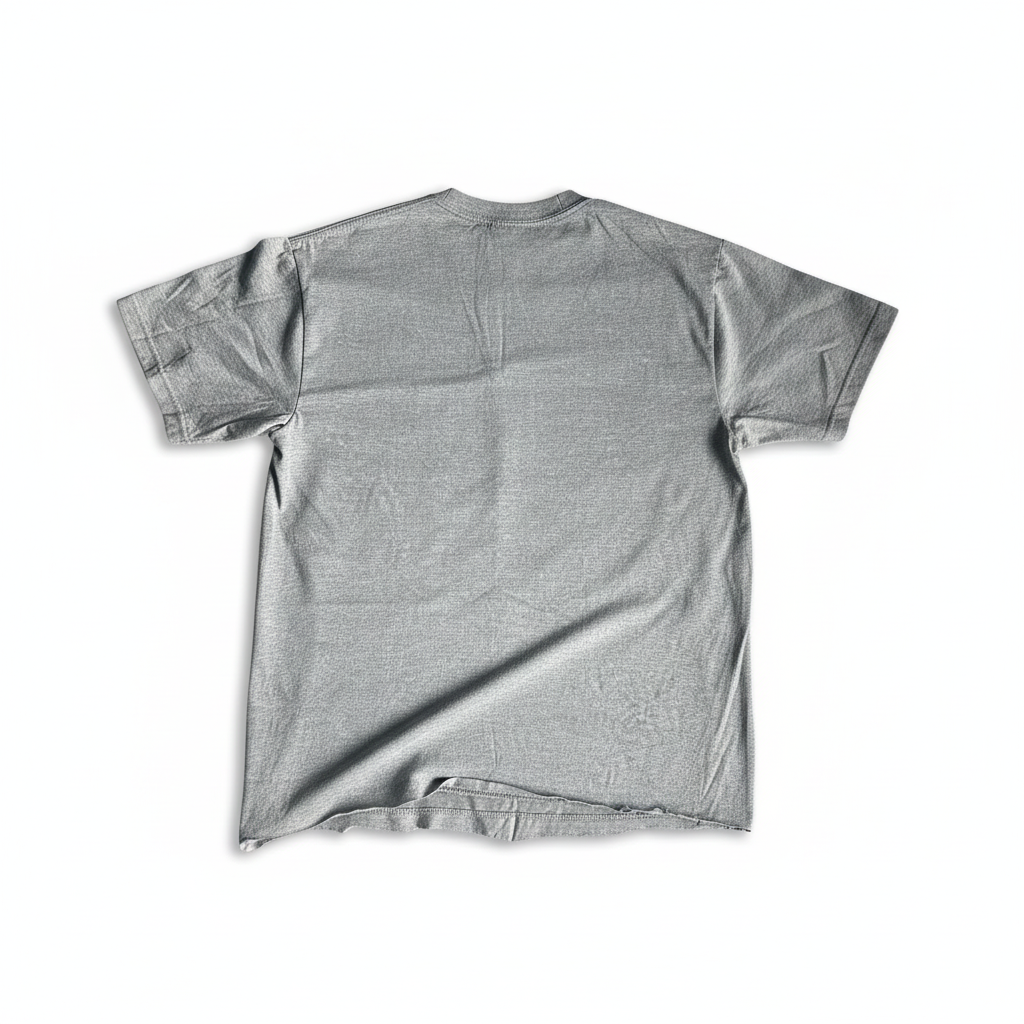Grey t-shirt flat lay with distressed hem on white background